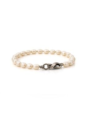 Tiffany & Co. Pearl bracelet with sterling silver infinity clasp.